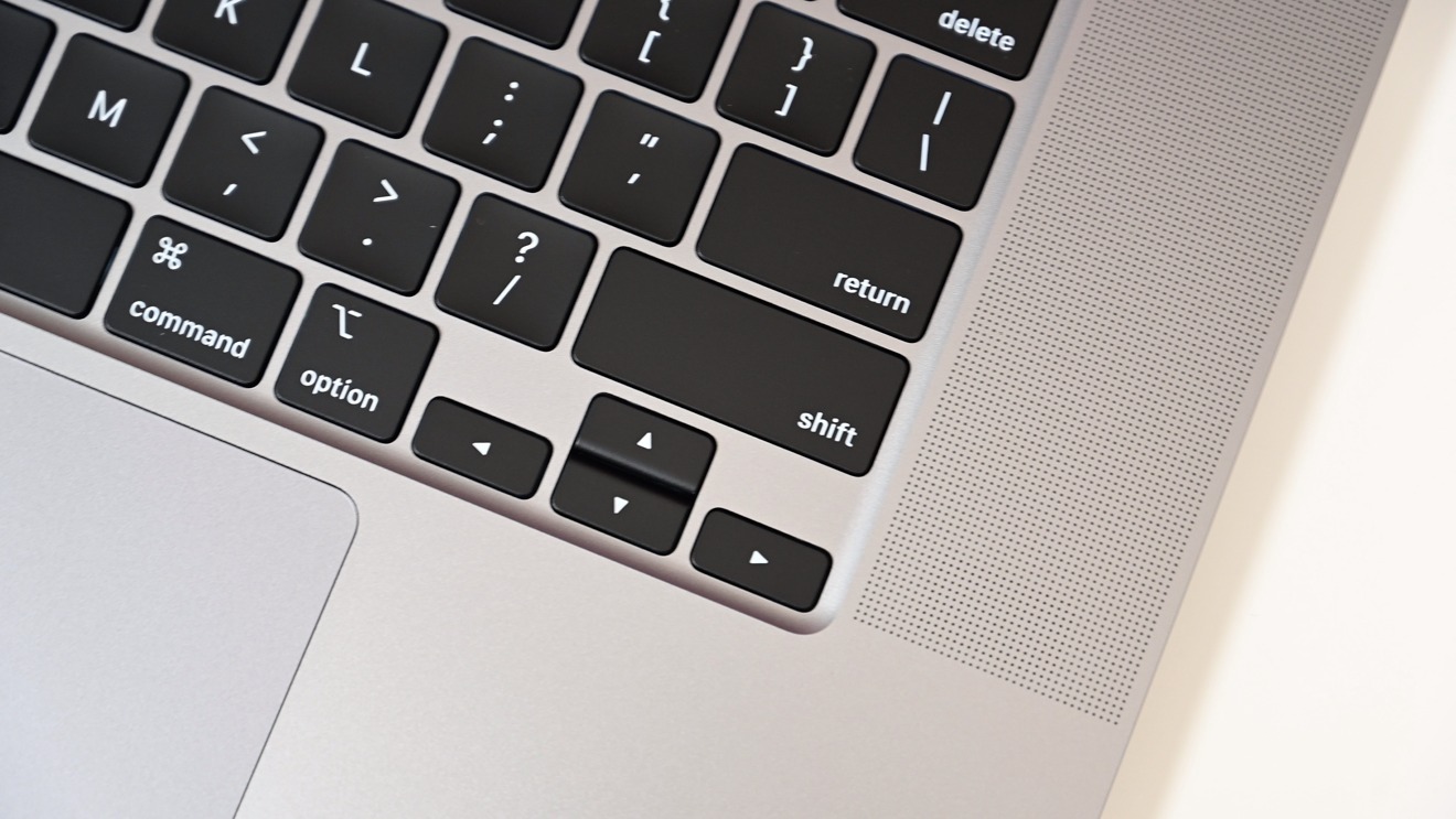An image of a Macbook's arrow keys